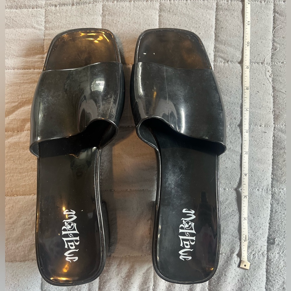 Open toe, short black heels